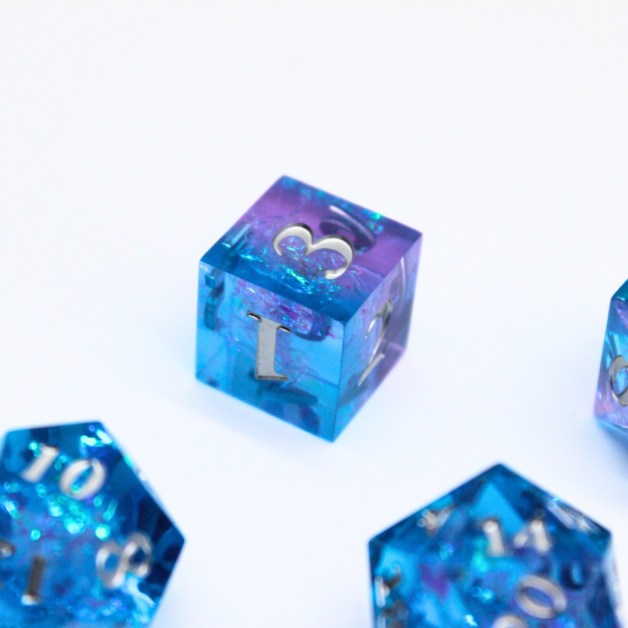 Nebula Cascade 7pcs Inclusion Dice Set | Sharp Edge Dice