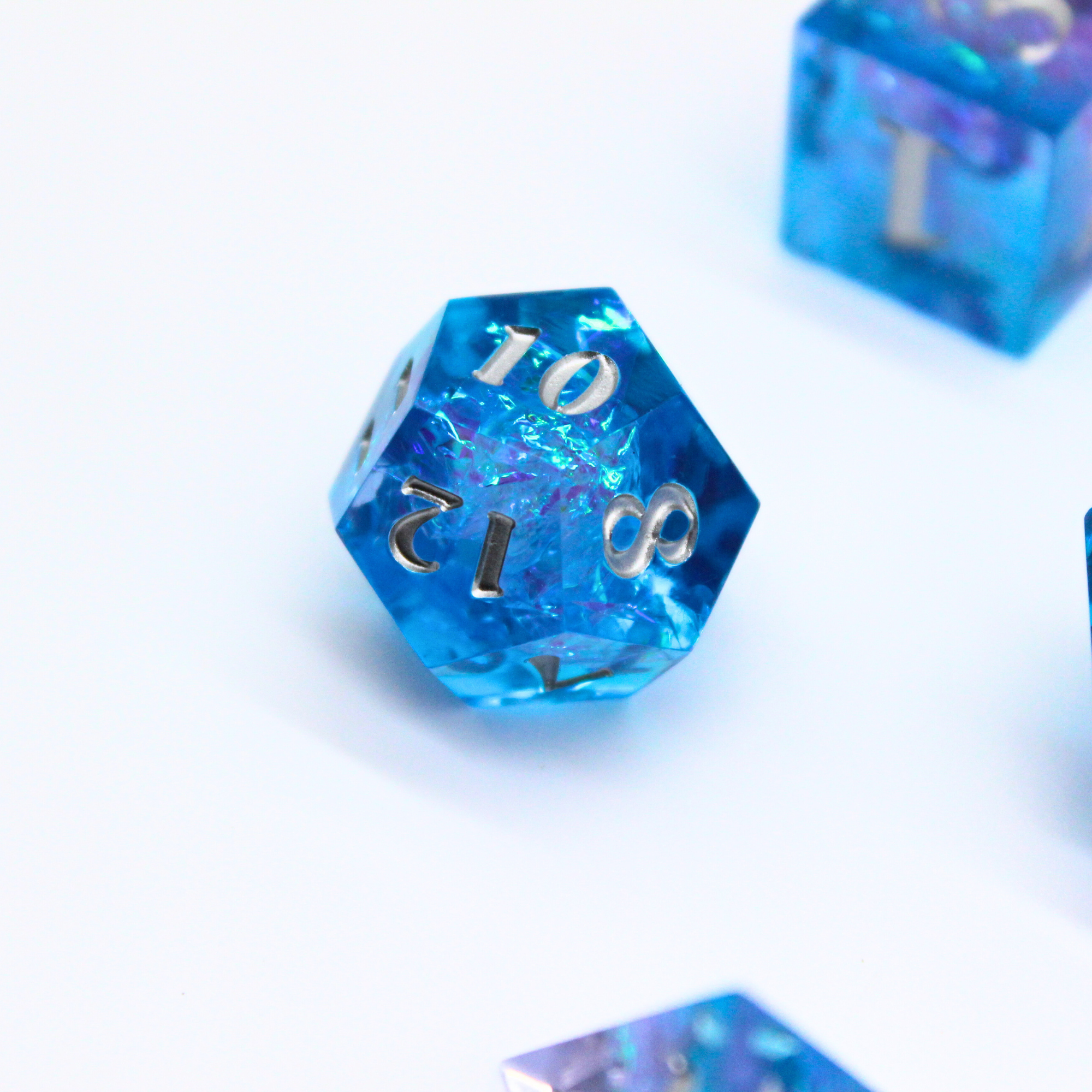 Nebula Cascade 7pcs Inclusion Dice Set | Sharp Edge Dice
